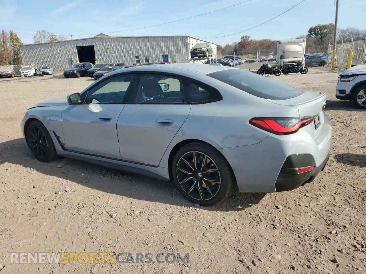 2 fotografías del automóvil dañado WBA63AV08NFM13396 BMW 4 SERIES 2022