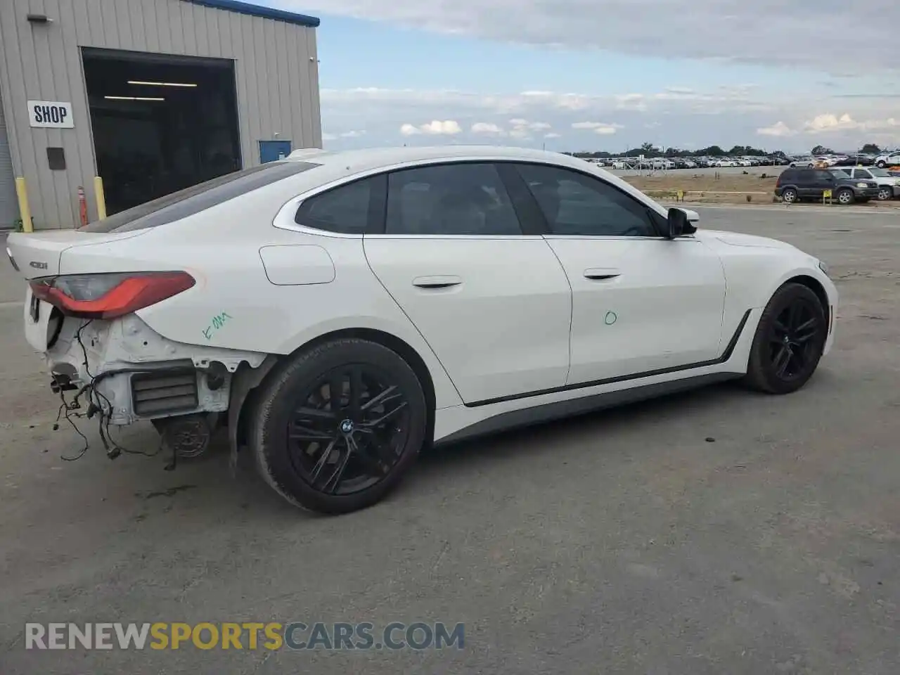 3 Photograph of a damaged car WBA63AV0XNFM01668 BMW 4 SERIES 2022
