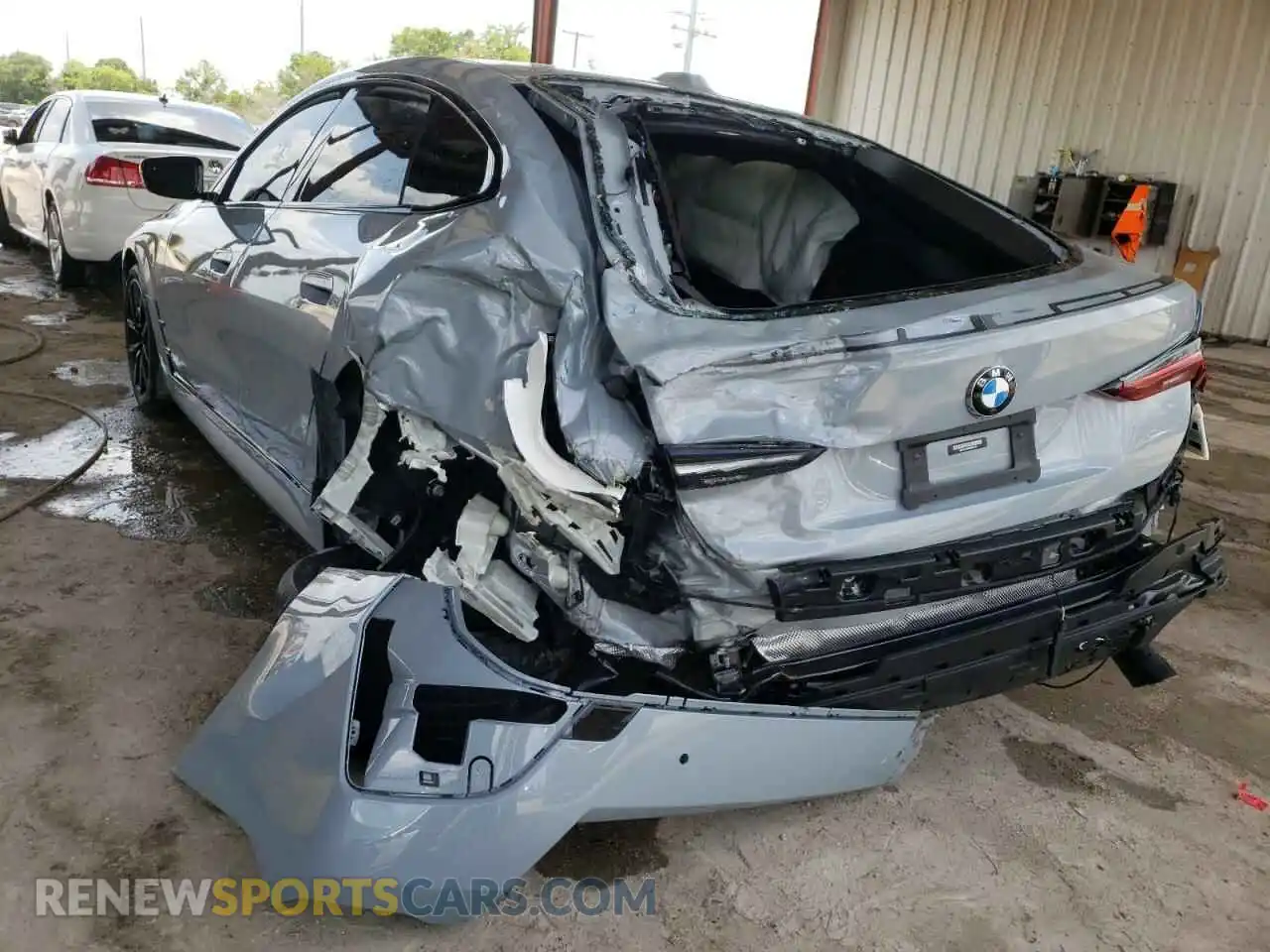 3 Photograph of a damaged car WBA63AV0XNFM06160 BMW 4 SERIES 2022
