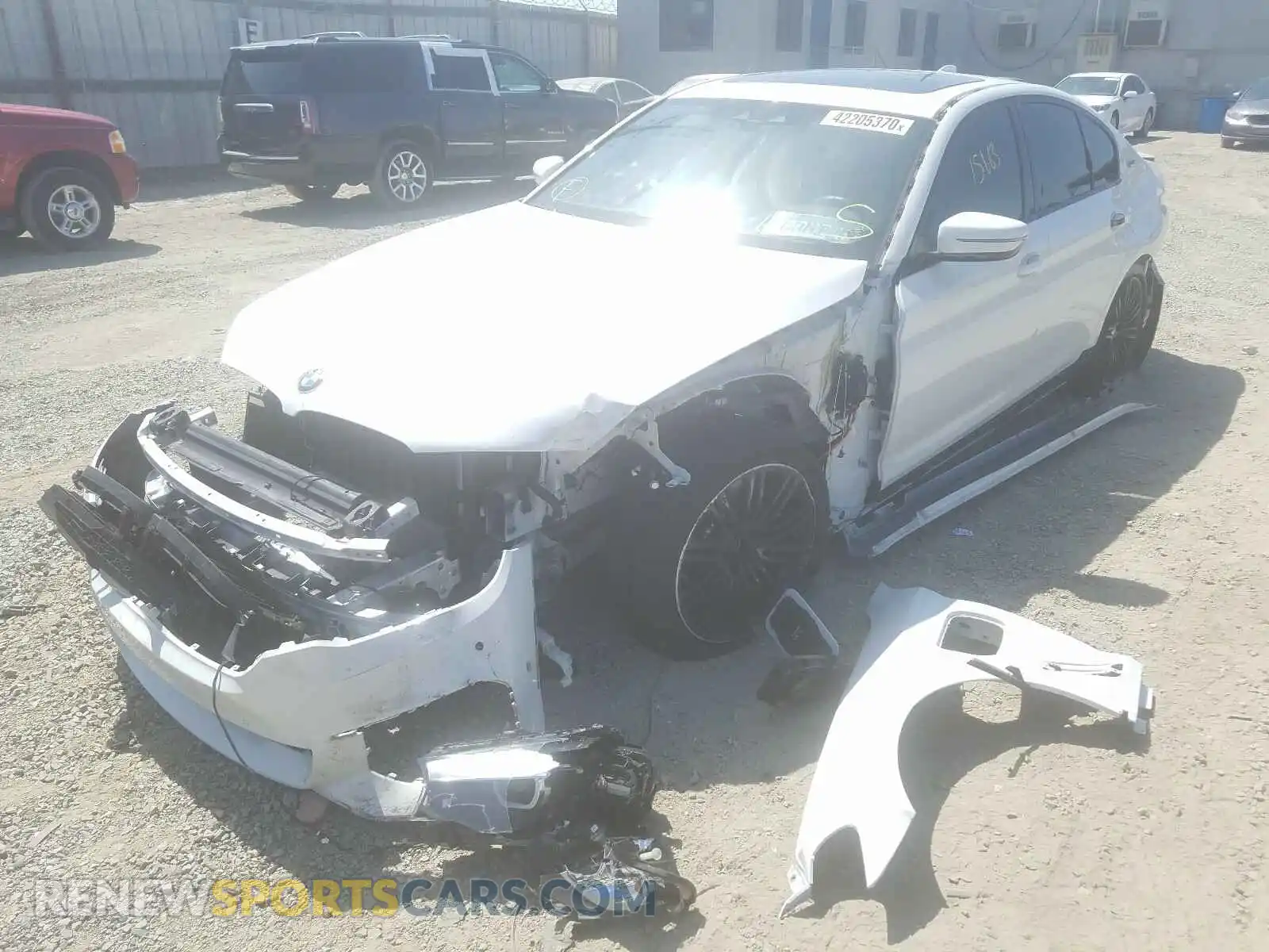 2 Photograph of a damaged car WBAJA9C54KB399352 BMW 5 SERIES 2019