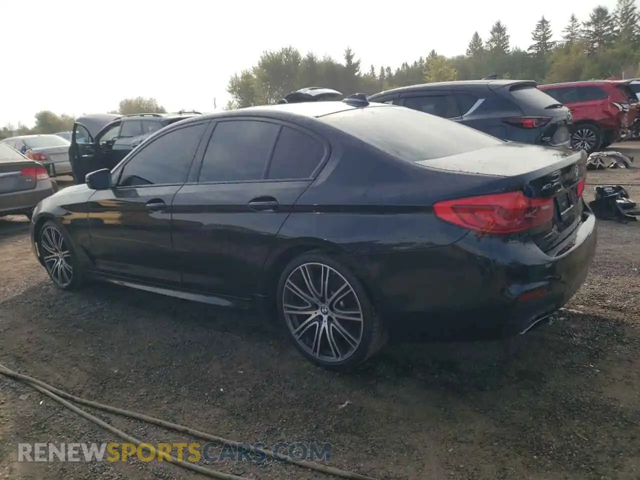 2 Photograph of a damaged car WBAJE7C54KWW14049 BMW 5 SERIES 2019