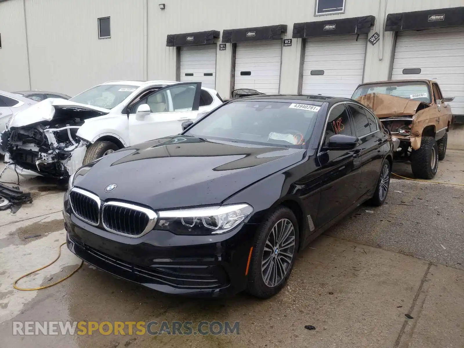 2 Photograph of a damaged car WBAJE7C59KWW12362 BMW 5 SERIES 2019