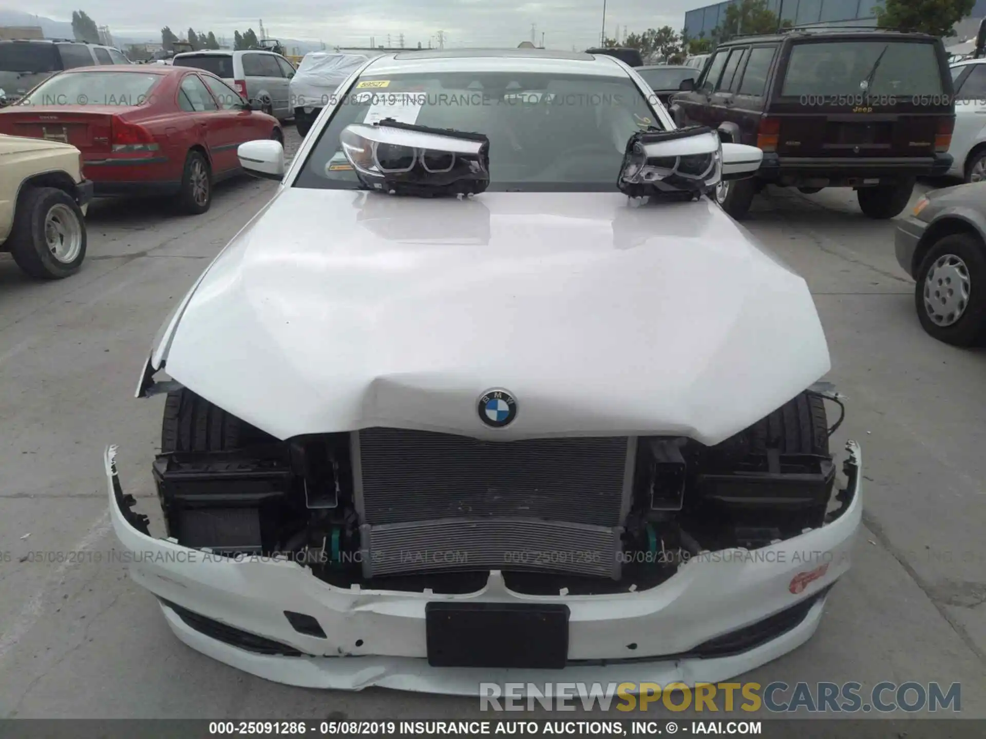 6 Photograph of a damaged car WBAJA9C53KB253699 BMW 530E 2019