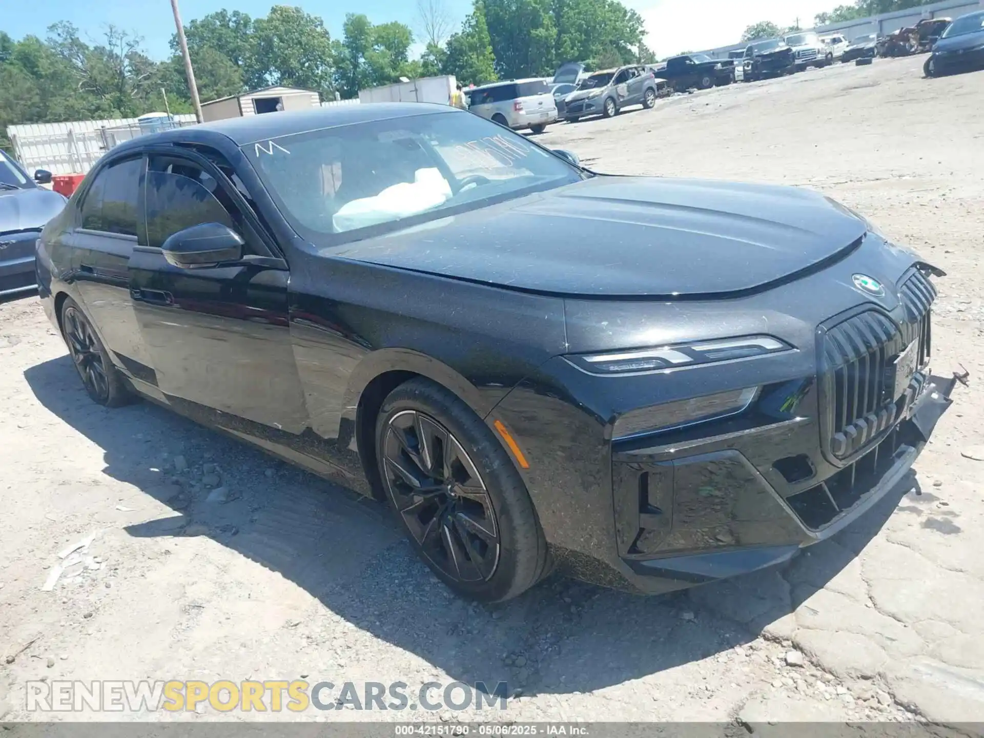 1 Photograph of a damaged car WBA23EH01PCN58267 BMW 740 2023