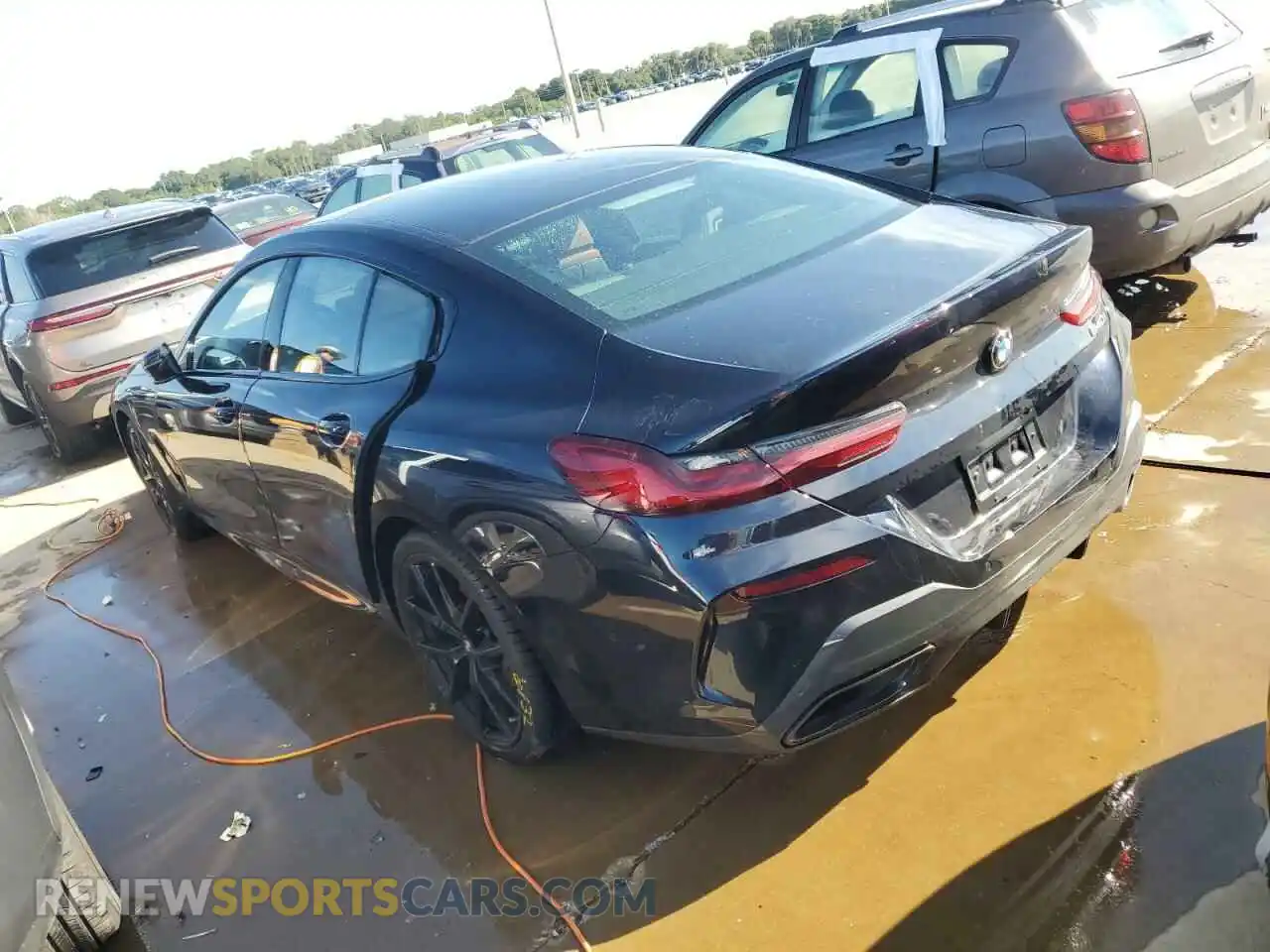 2 Photograph of a damaged car WBAGV2C03RCN18605 BMW 8 SERIES 2024
