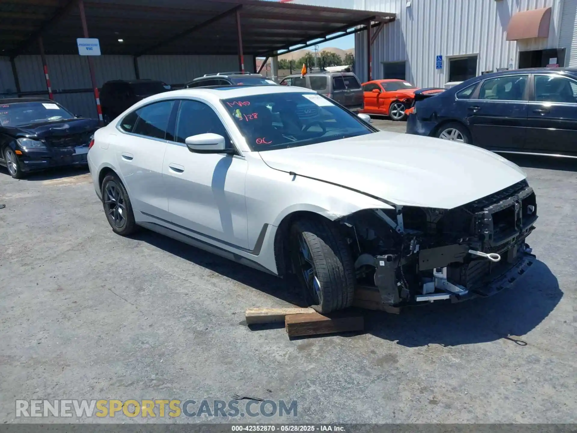 1 Photograph of a damaged car WBY43AW09RFS19070 BMW I4 2024