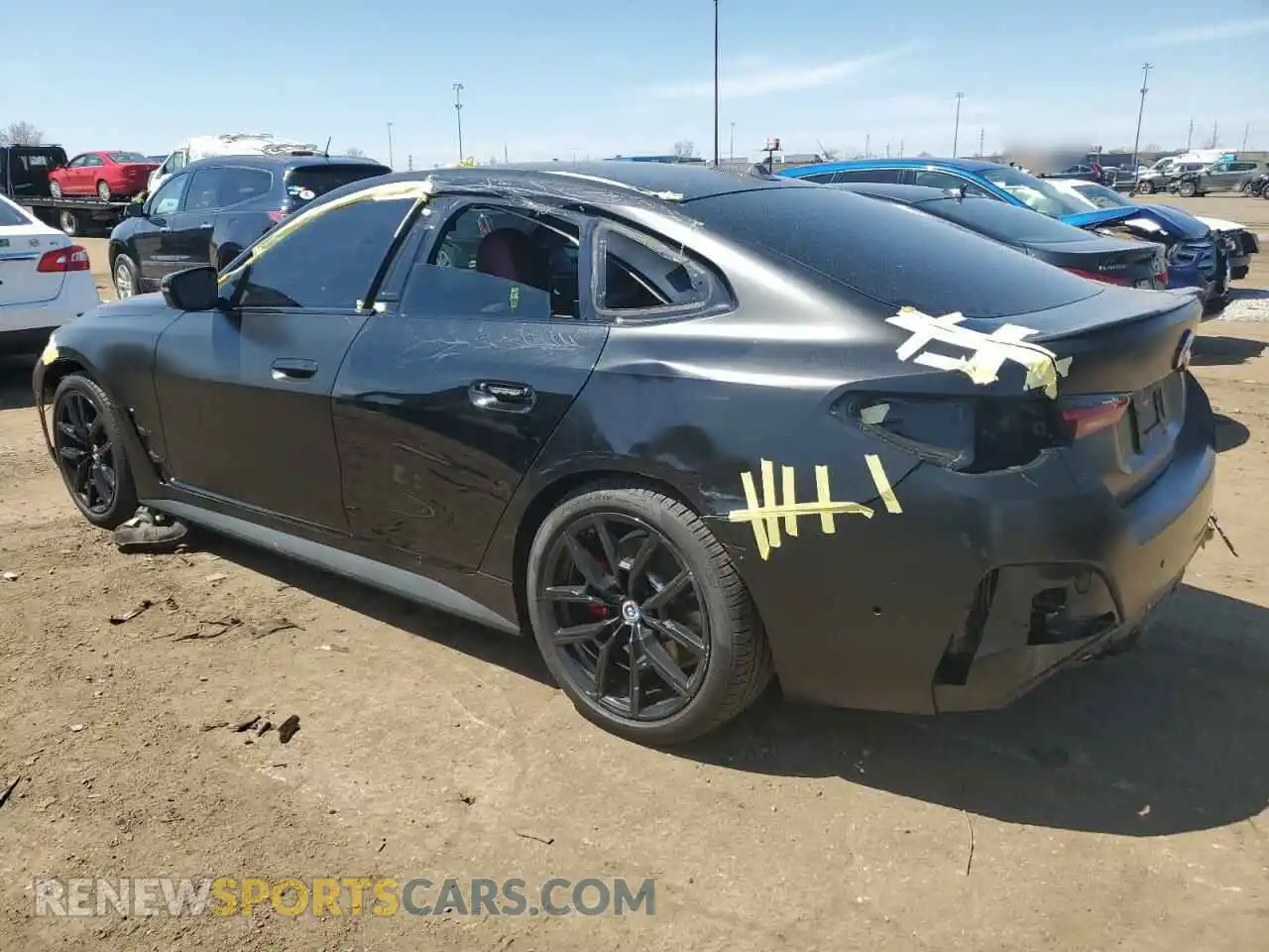 2 fotografías del automóvil dañado WBY33AW01PFP07728 BMW I4 M50 2023