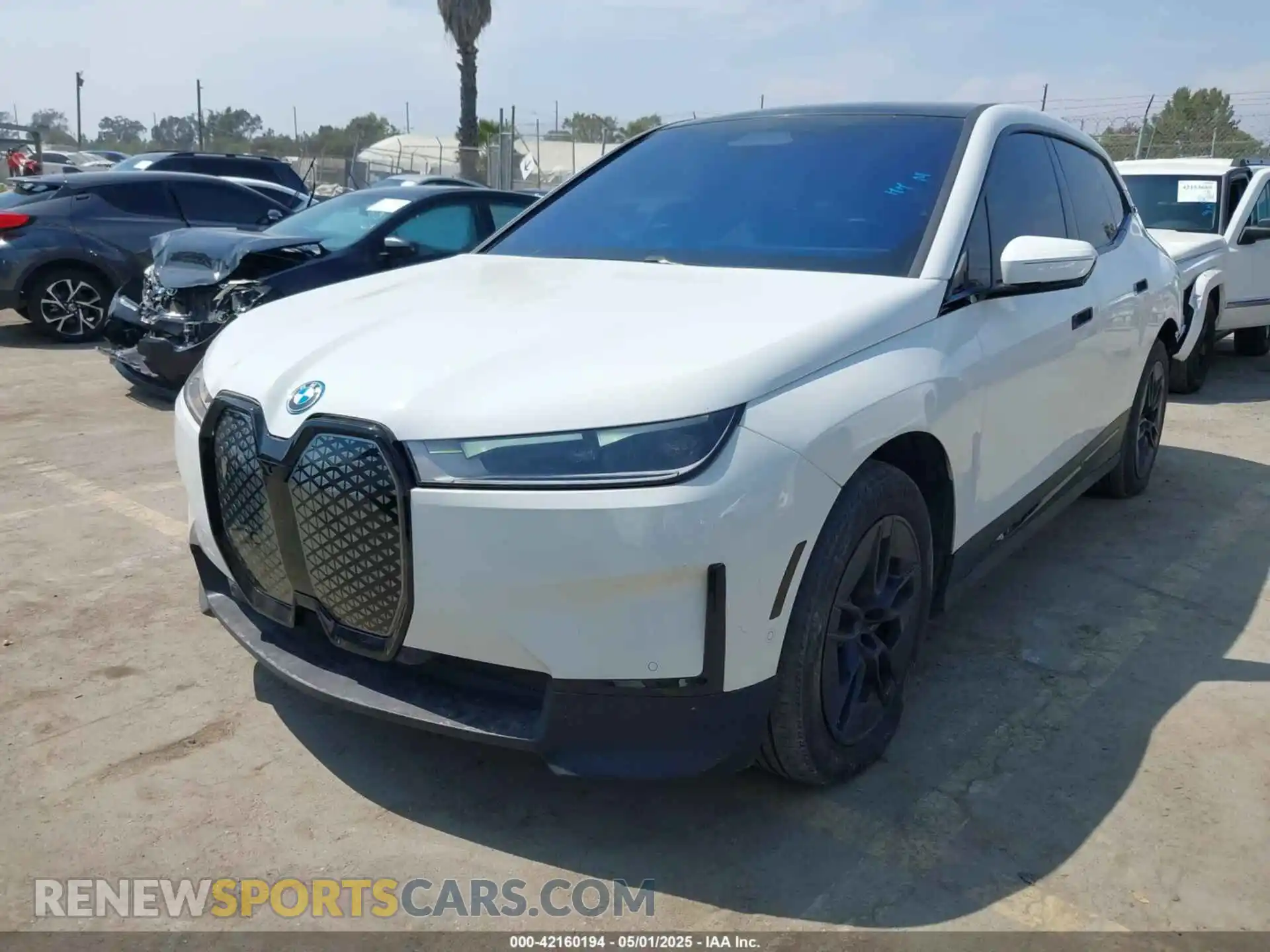 2 Photograph of a damaged car WB523CF07RCN60873 BMW IX 2024