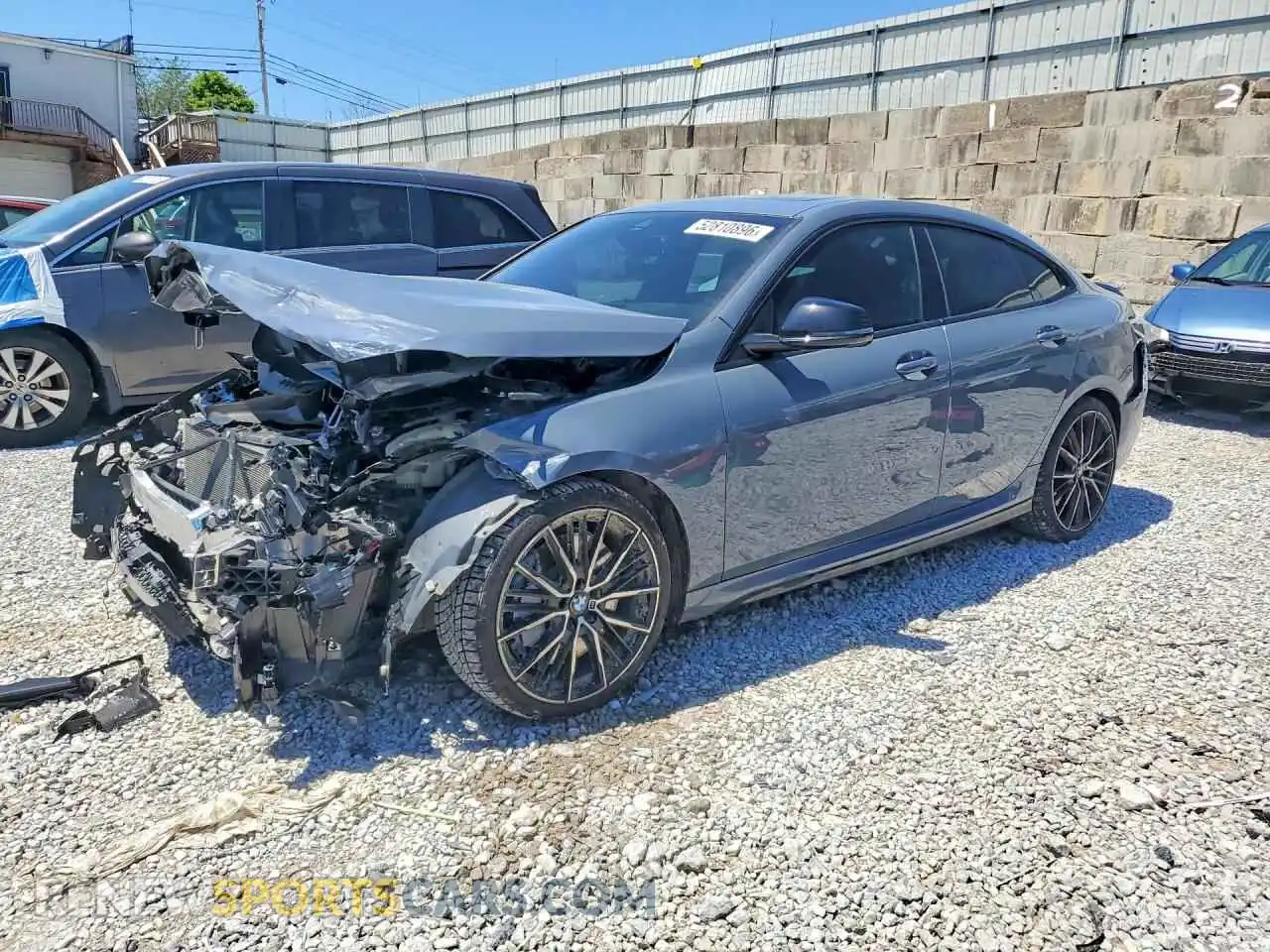 1 Photograph of a damaged car WBA13AL03M7H39793 BMW M2 2021