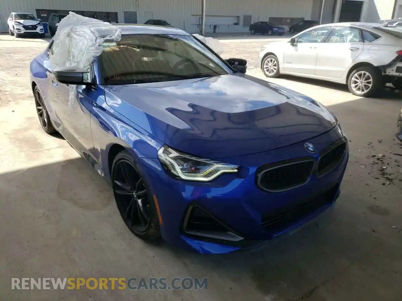 1 Photograph of a damaged car 3MW53CM03N8C40131 BMW M2 2022