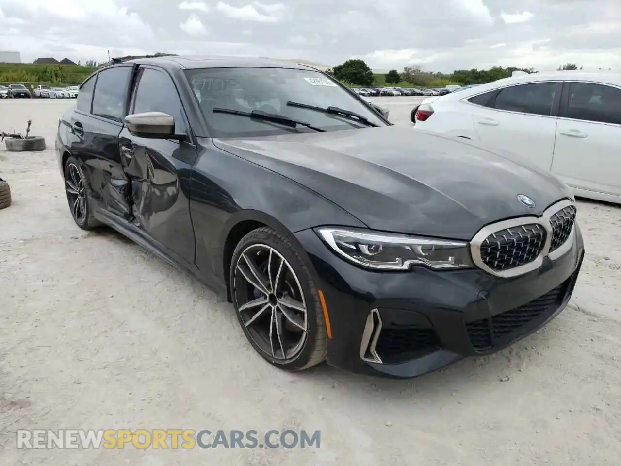 1 Photograph of a damaged car WBA5U7C07LA234193 BMW M3 2020