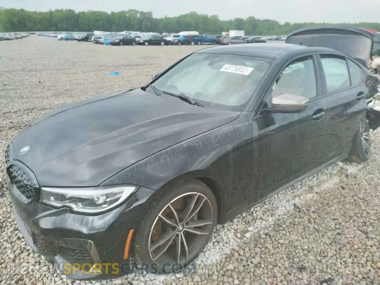 2 Photograph of a damaged car WBA5U9C03LFH98649 BMW M3 2020