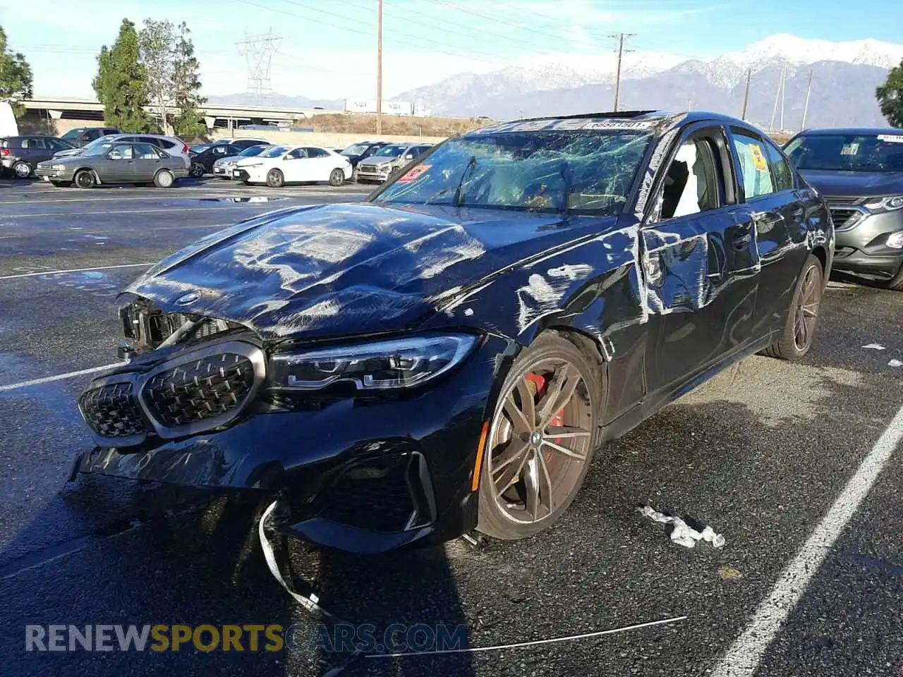 2 Photograph of a damaged car 3MW5U7J01M8B55599 BMW M3 2021