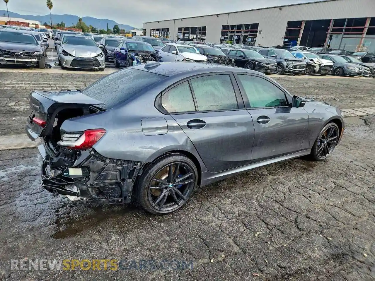 3 Photograph of a damaged car 3MW5U7J01M8C14196 BMW M3 2021