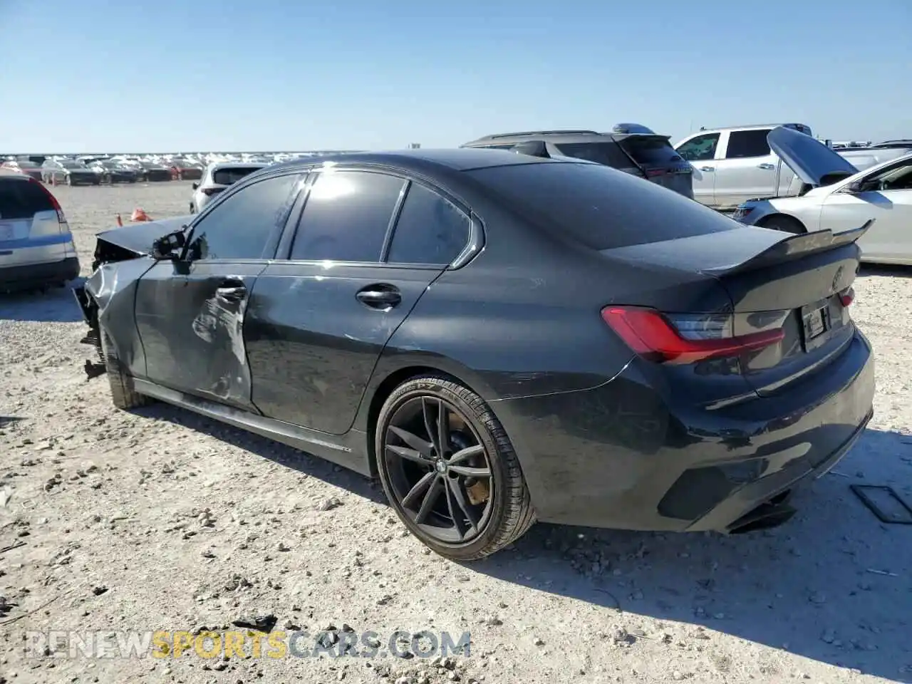 2 Photograph of a damaged car 3MW5U7J03M8C02731 BMW M3 2021