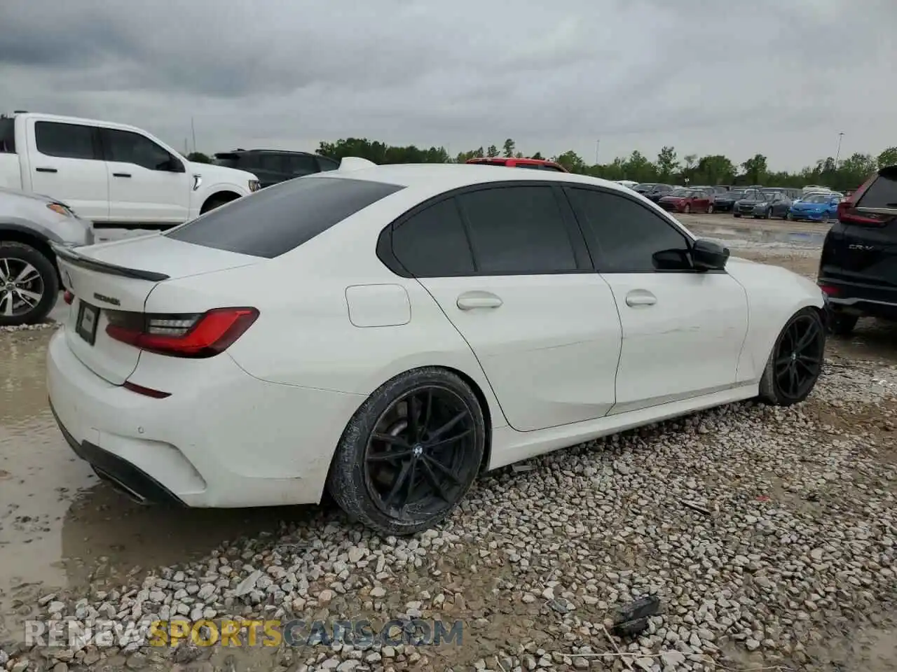 3 Photograph of a damaged car 3MW5U7J08M8C10971 BMW M3 2021