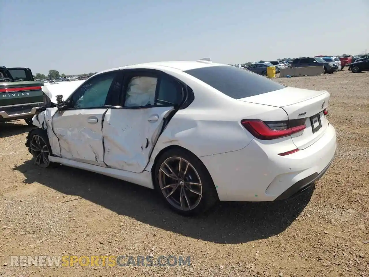 2 Photograph of a damaged car 3MW5U9J03M8B90544 BMW M3 2021
