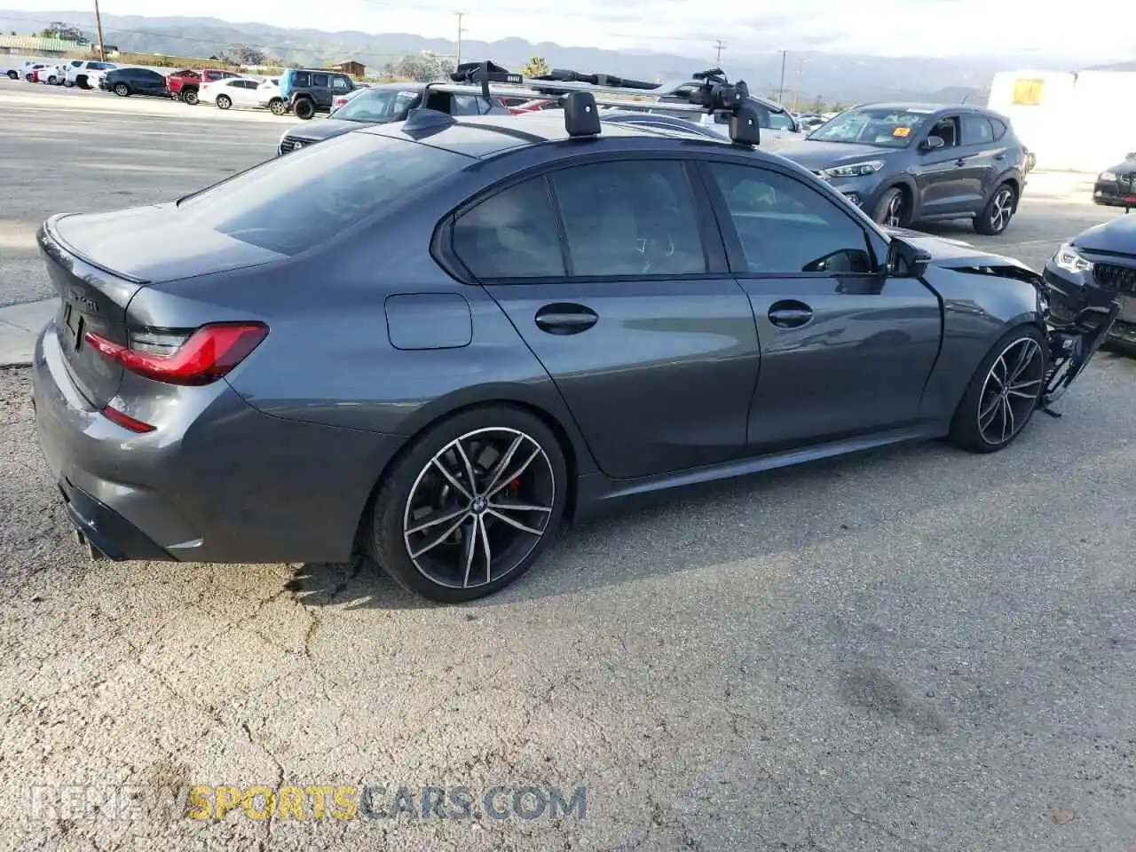 3 Photograph of a damaged car 3MW5U9J03M8C12056 BMW M3 2021