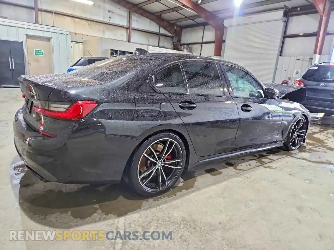 3 Photograph of a damaged car 3MW5U9J07M8B61273 BMW M3 2021