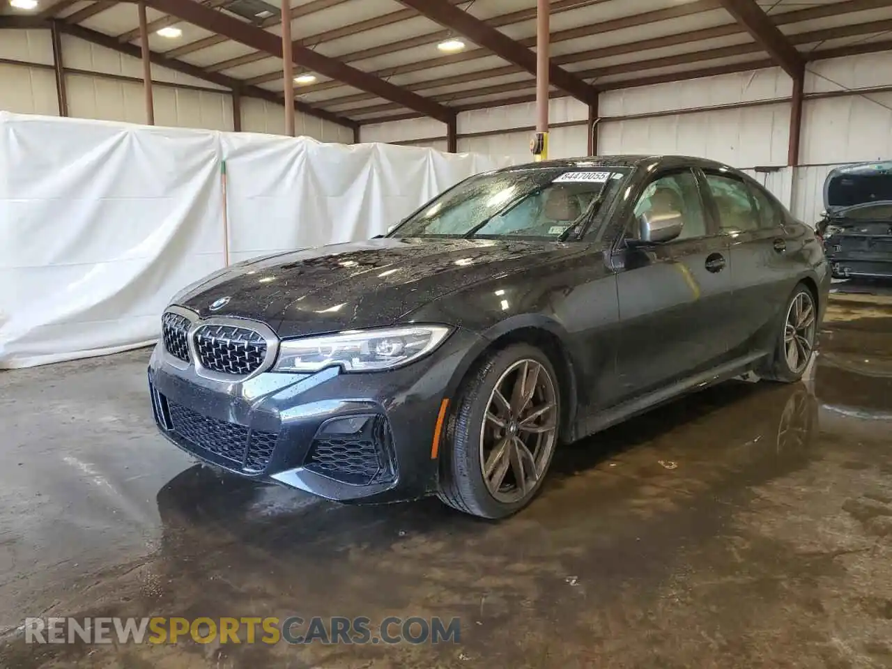 1 Photograph of a damaged car 3MW5U9J0XM8B64684 BMW M3 2021