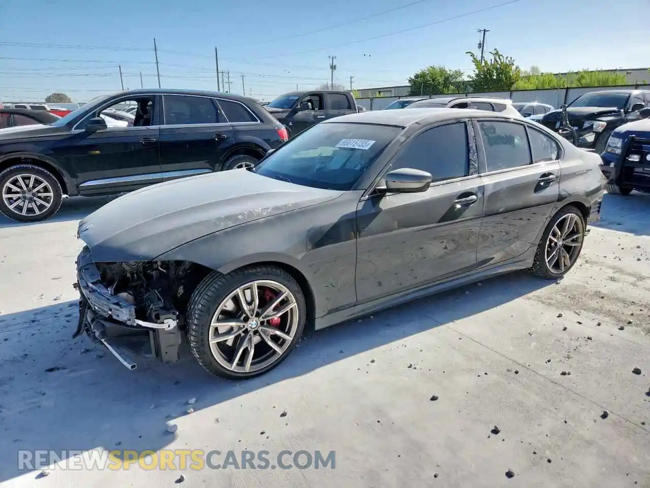 1 Photograph of a damaged car WBA5U7C03MFK58043 BMW M3 2021