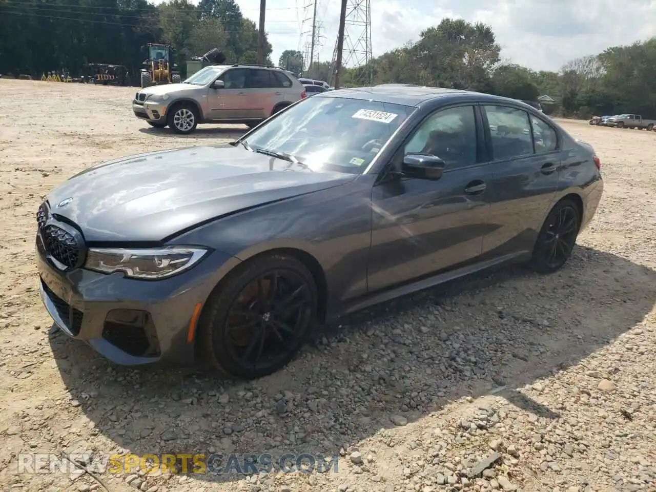 1 Photograph of a damaged car WBA5U9C06MFK07213 BMW M3 2021
