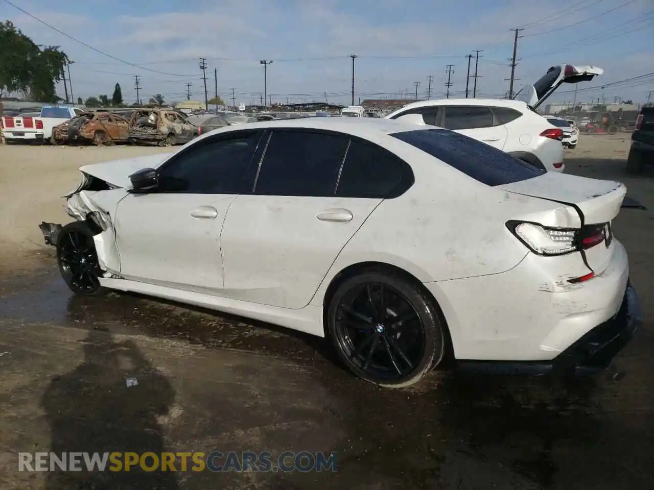 2 Photograph of a damaged car 3MW5U7J07N8C74808 BMW M3 2022