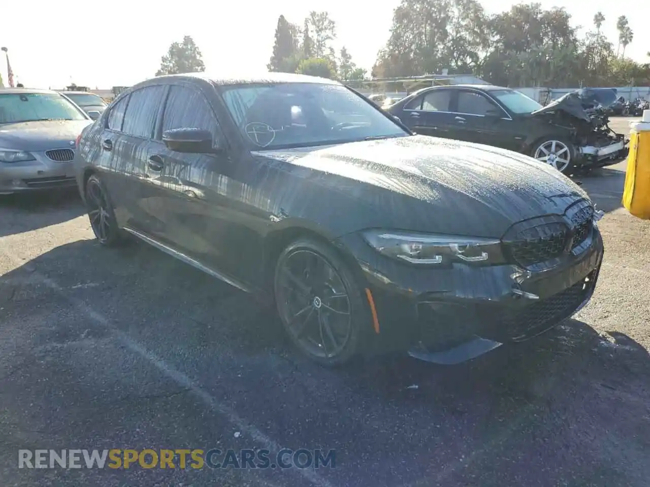 1 Photograph of a damaged car WBA5U7C0XNFM73498 BMW M3 2022