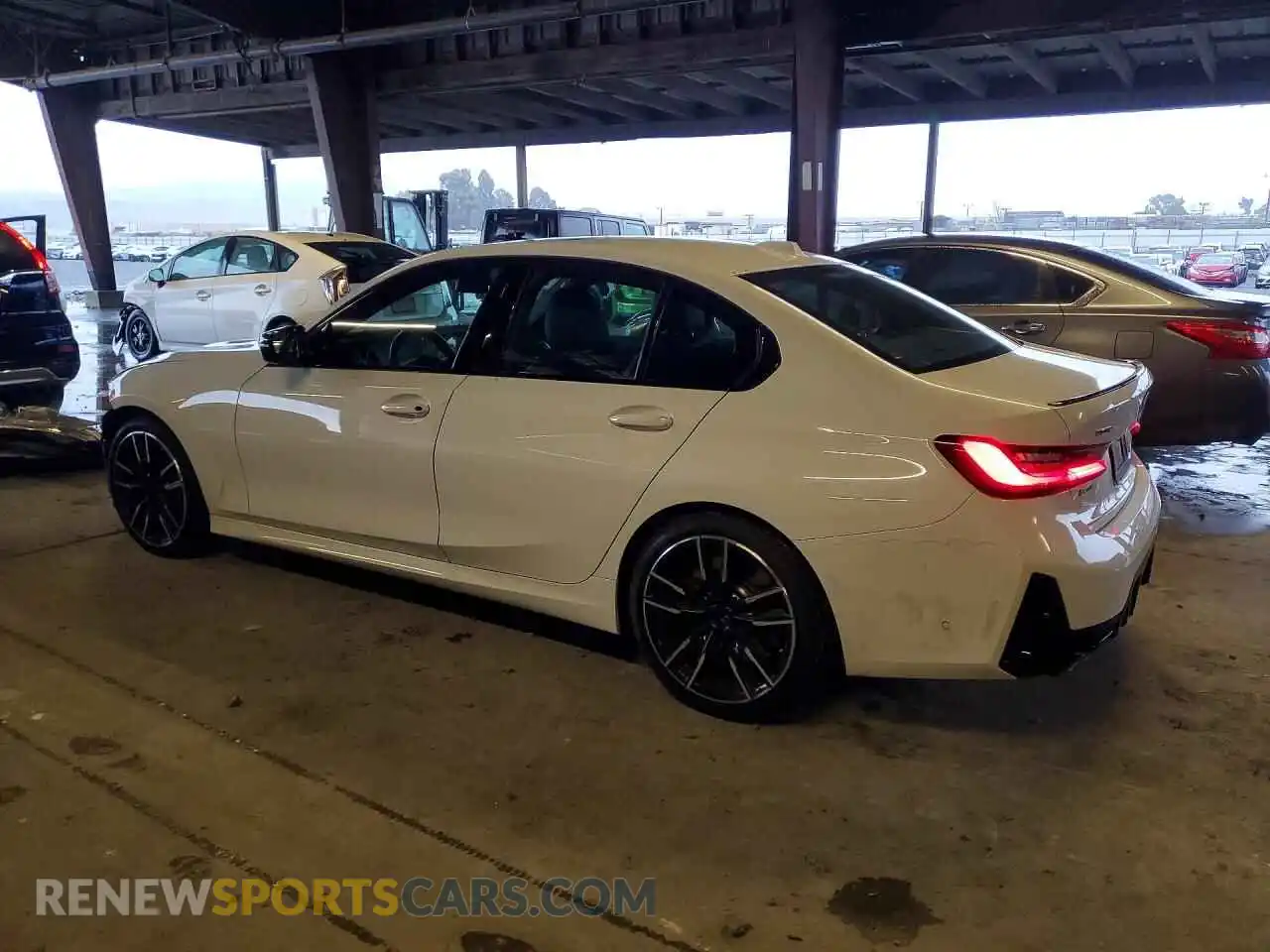 2 Photograph of a damaged car 3MW49FF00P8C86494 BMW M3 2023