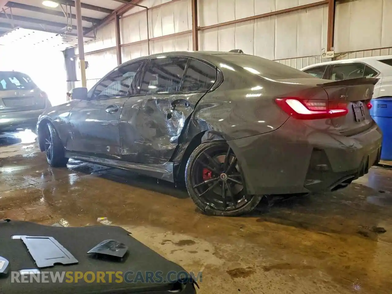 2 Photograph of a damaged car 3MW49FF03P8D04907 BMW M3 2023