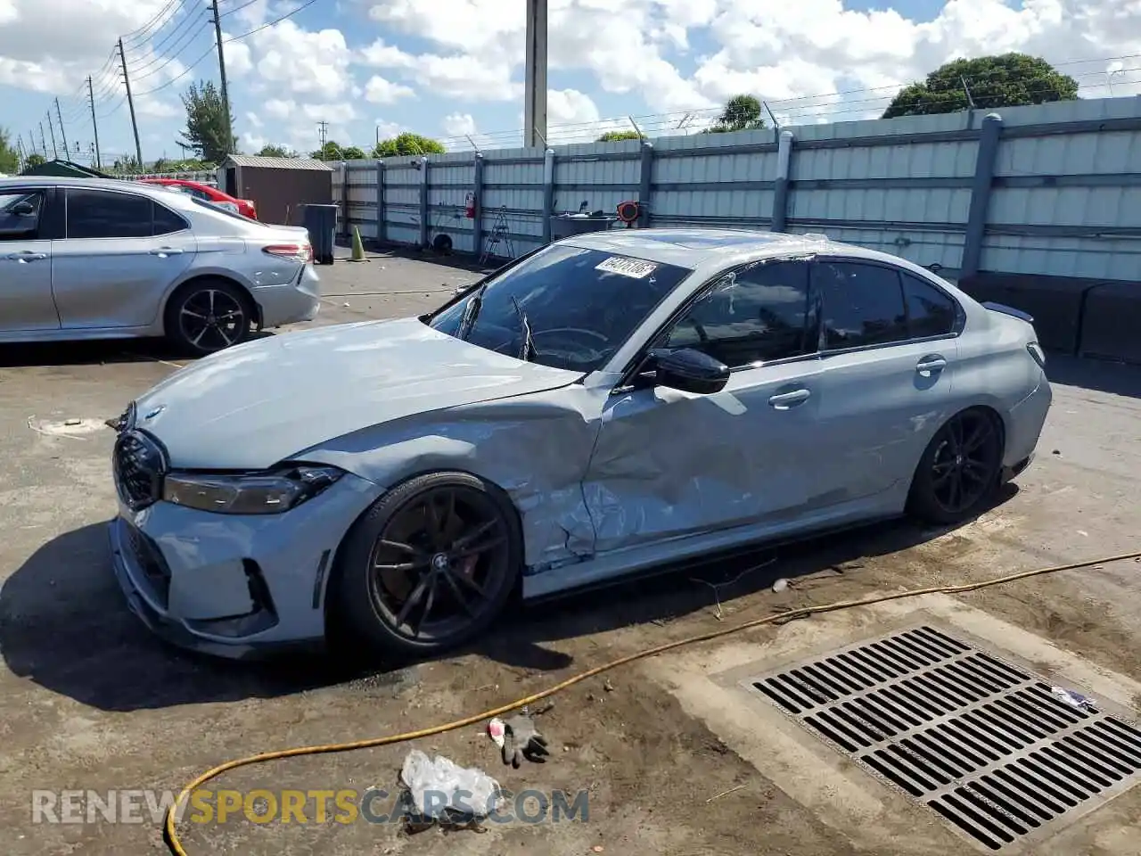 1 Photograph of a damaged car 3MW49FS09P8D65989 BMW M3 2023