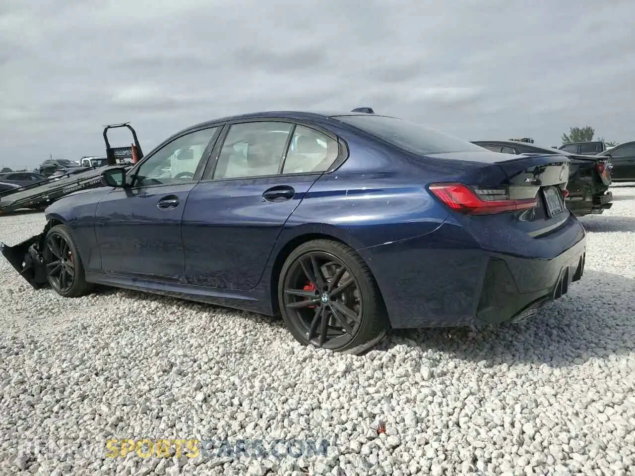 2 Photograph of a damaged car 3MW49FF02R8E70970 BMW M3 2024