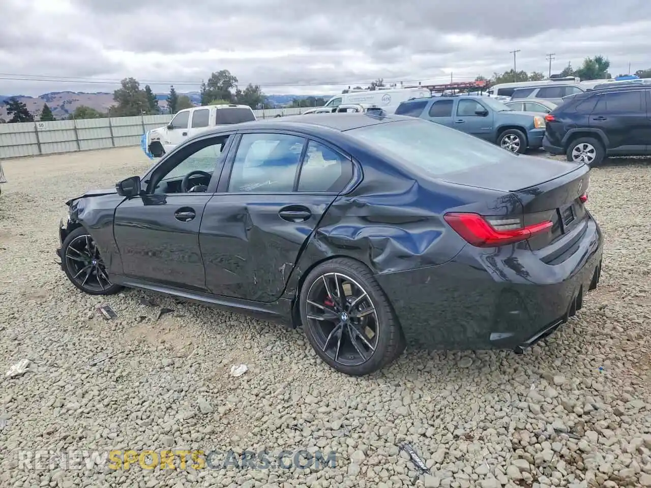 2 Photograph of a damaged car WBA53FT00TFW57648 BMW M3 2026