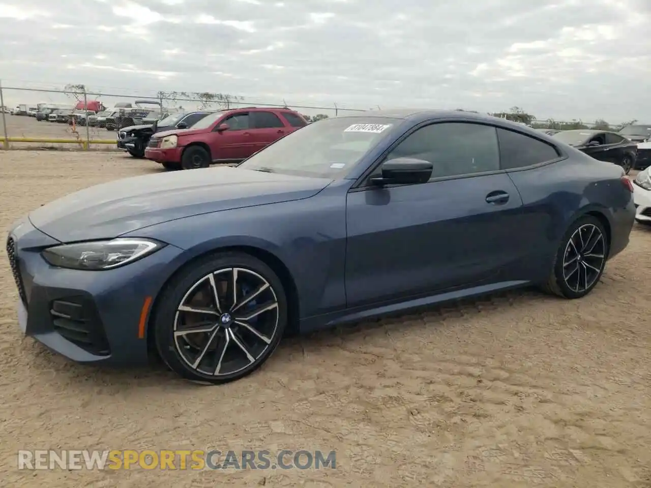 1 Photograph of a damaged car WBA13AR05MCF81875 BMW M4 2021