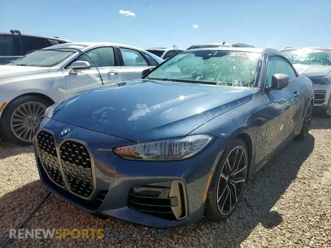 2 fotografías del automóvil dañado WBA53AT03MCG72489 BMW M4 2021