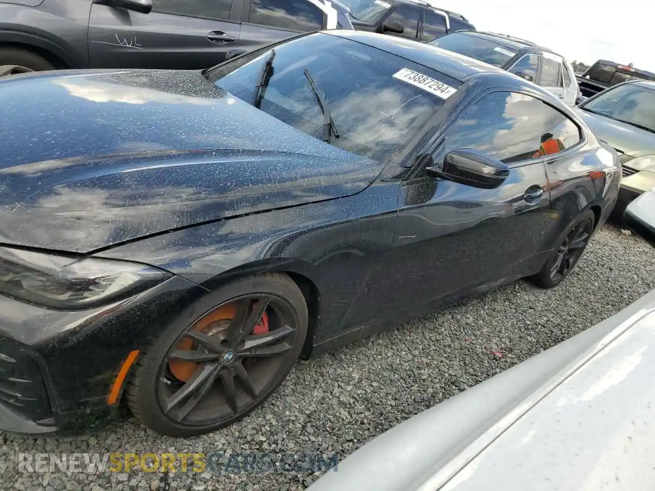 1 Photograph of a damaged car WBA13AR00NCH99689 BMW M4 2022