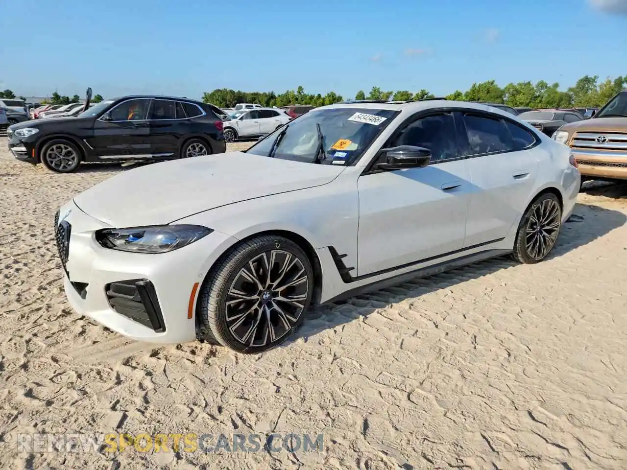 1 Photograph of a damaged car WBA13AW07NFM31249 BMW M4 2022