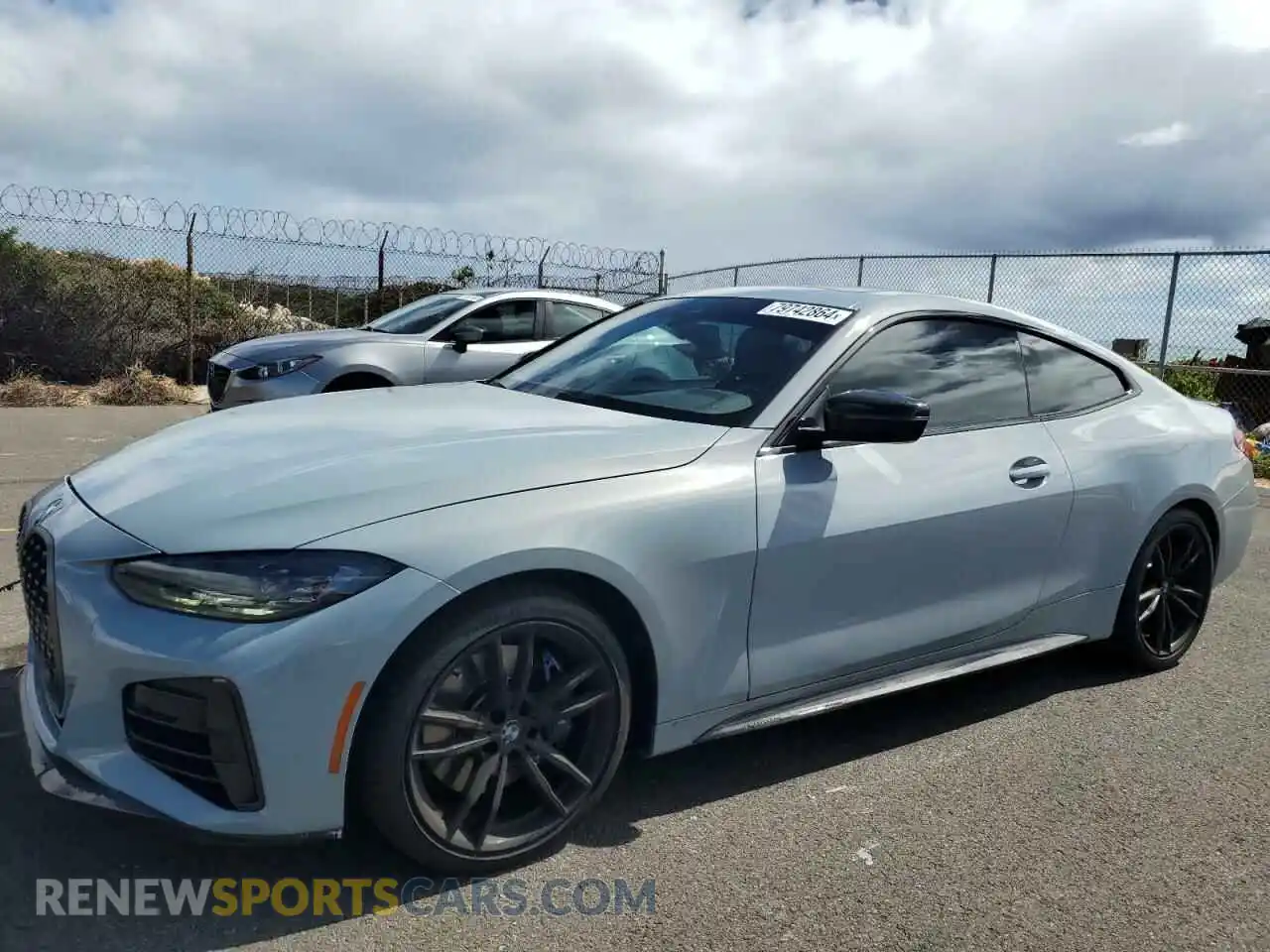1 Photograph of a damaged car WBA83AP00NCH81159 BMW M4 2022