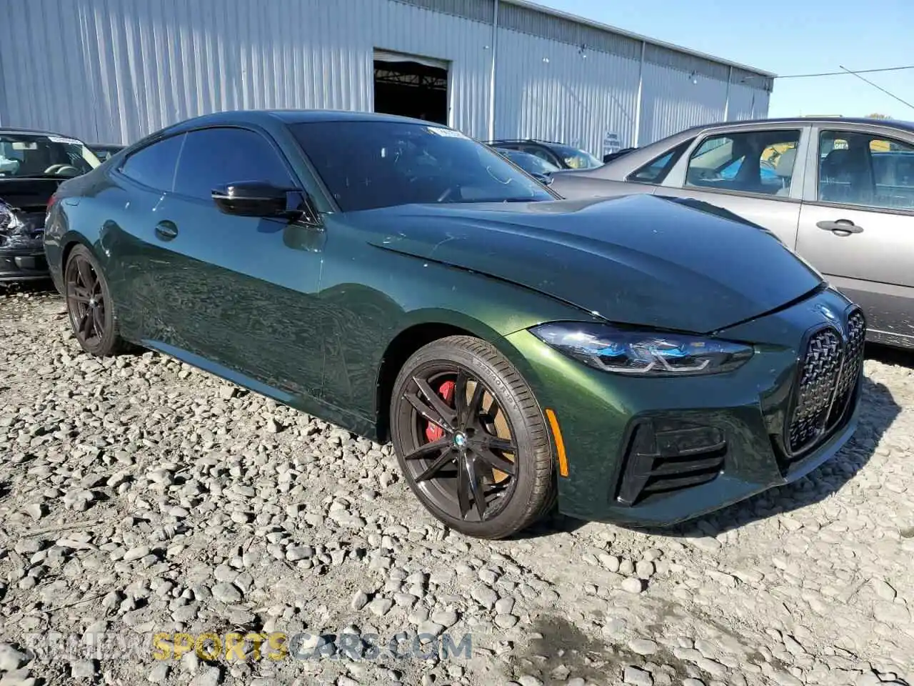 1 Photograph of a damaged car WBA83AP01NCJ22732 BMW M4 2022