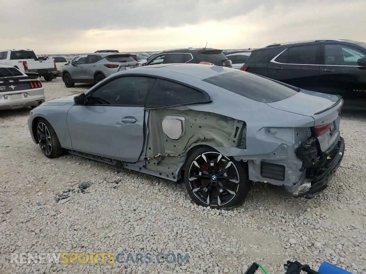 2 Photograph of a damaged car WBA83DA07SCT21855 BMW M4 2025