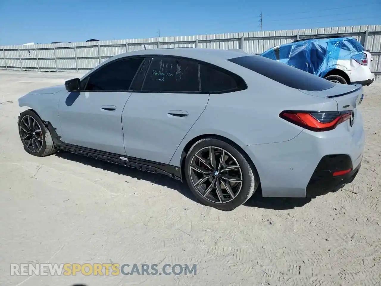 2 fotografías del automóvil dañado WBA13AW00RFR22624 BMW M440XI GRA 2024