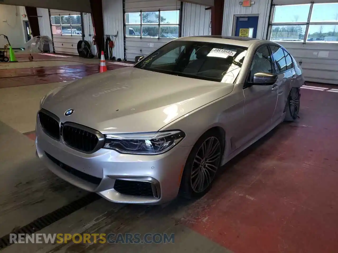 2 fotografías del automóvil dañado WBAJB9C59KB465052 BMW M5 2019