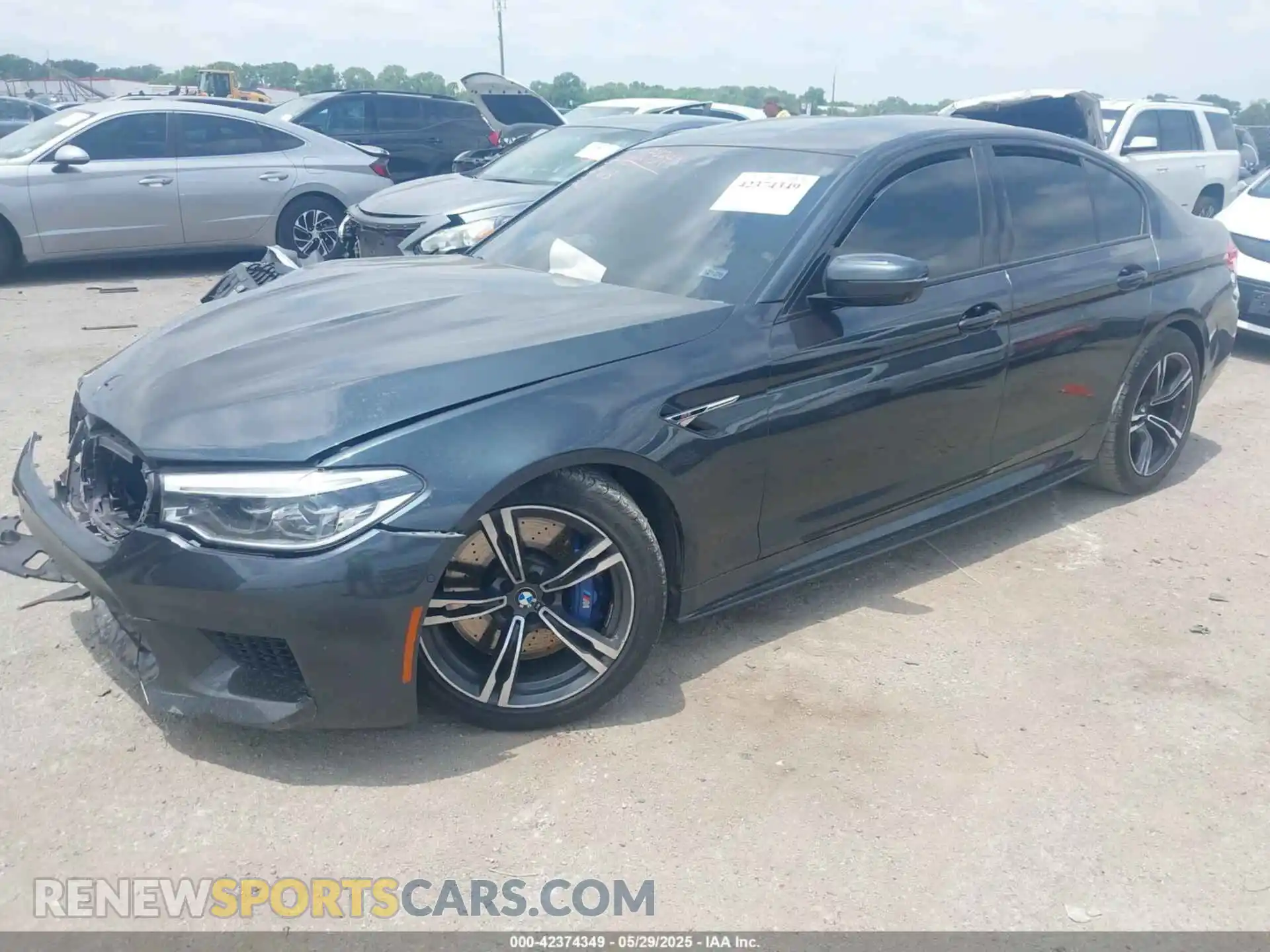 2 fotografías del automóvil dañado WBSJF0C58KB447623 BMW M5 2019