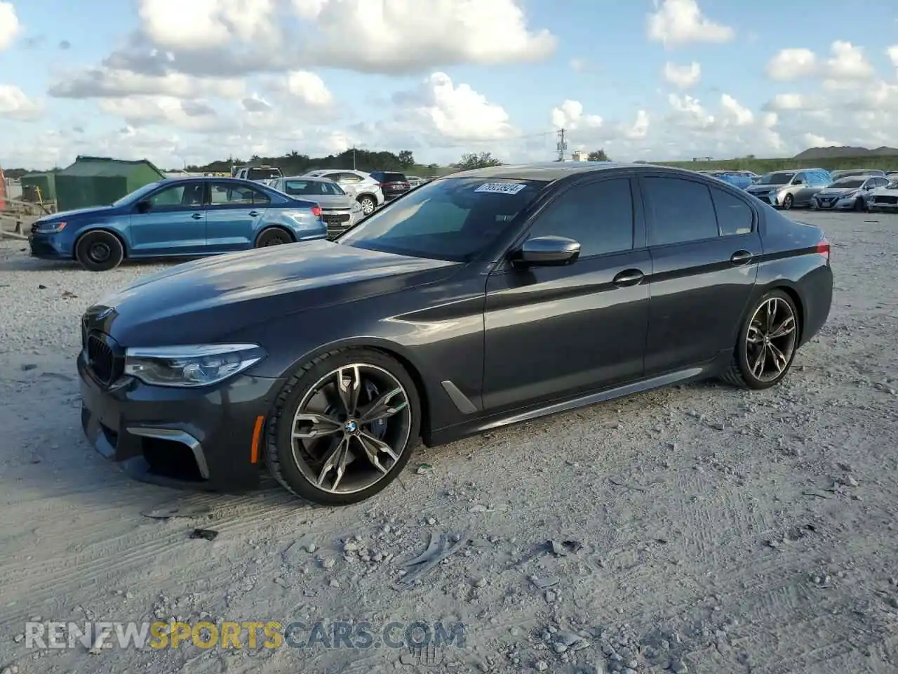 1 Photograph of a damaged car WBAJS7C06LCD34796 BMW M5 2020