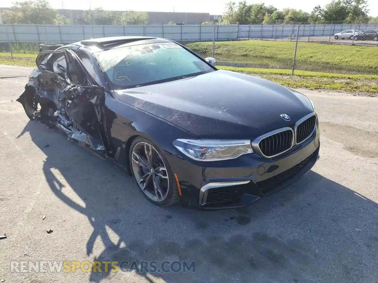 1 Photograph of a damaged car WBAJS7C06LCD52702 BMW M5 2020