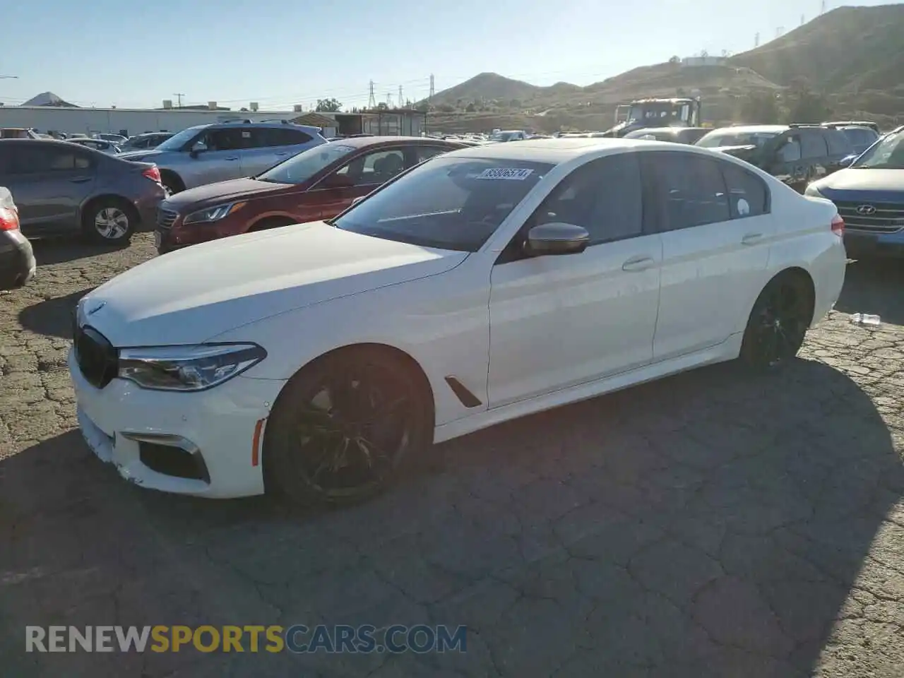 1 Photograph of a damaged car WBAJS7C07LCD89273 BMW M5 2020