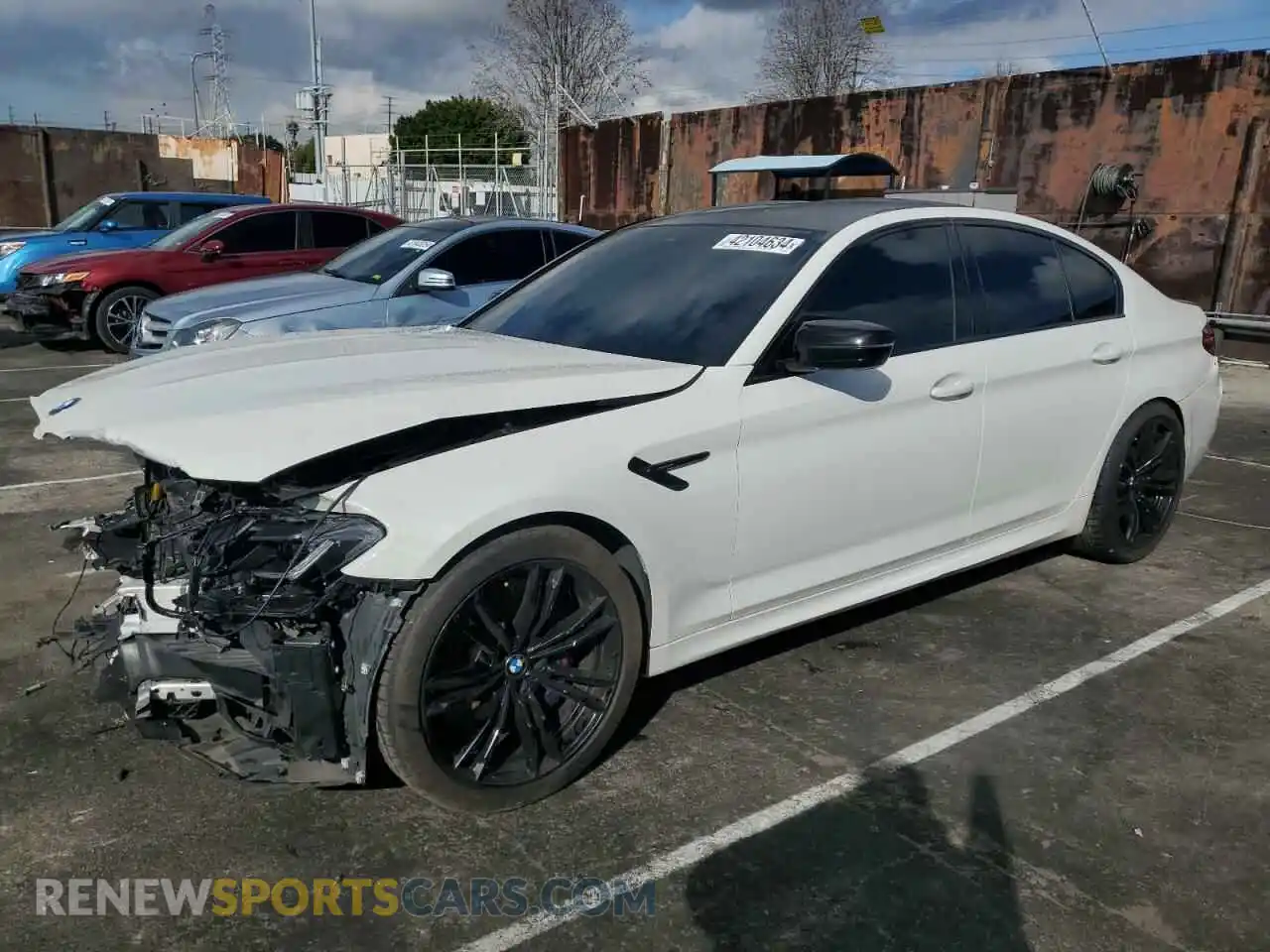 1 Photograph of a damaged car WBS83CH06MCG00652 BMW M5 2021
