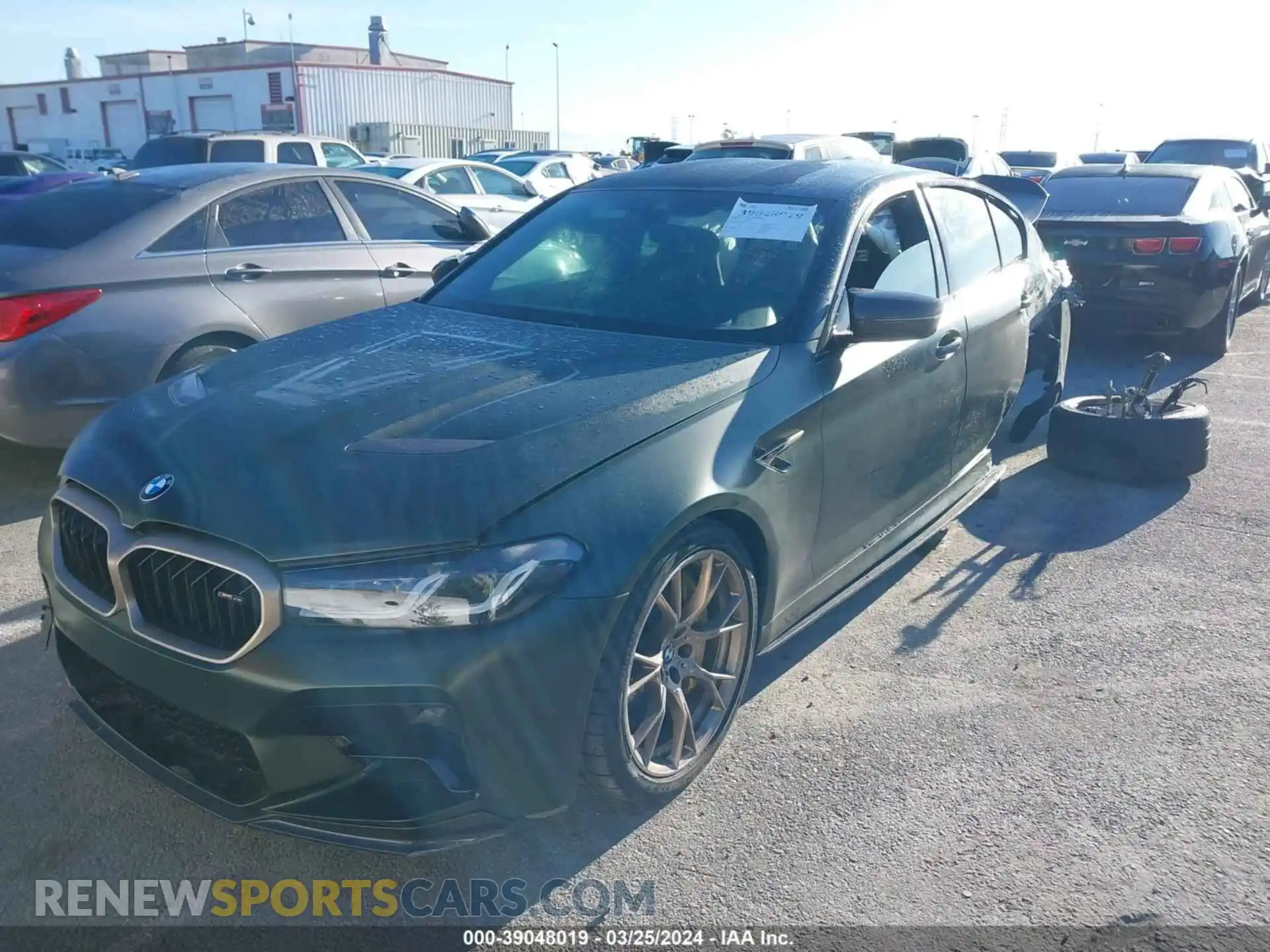 2 Photograph of a damaged car WBS73CH02NCJ35152 BMW M5 2022