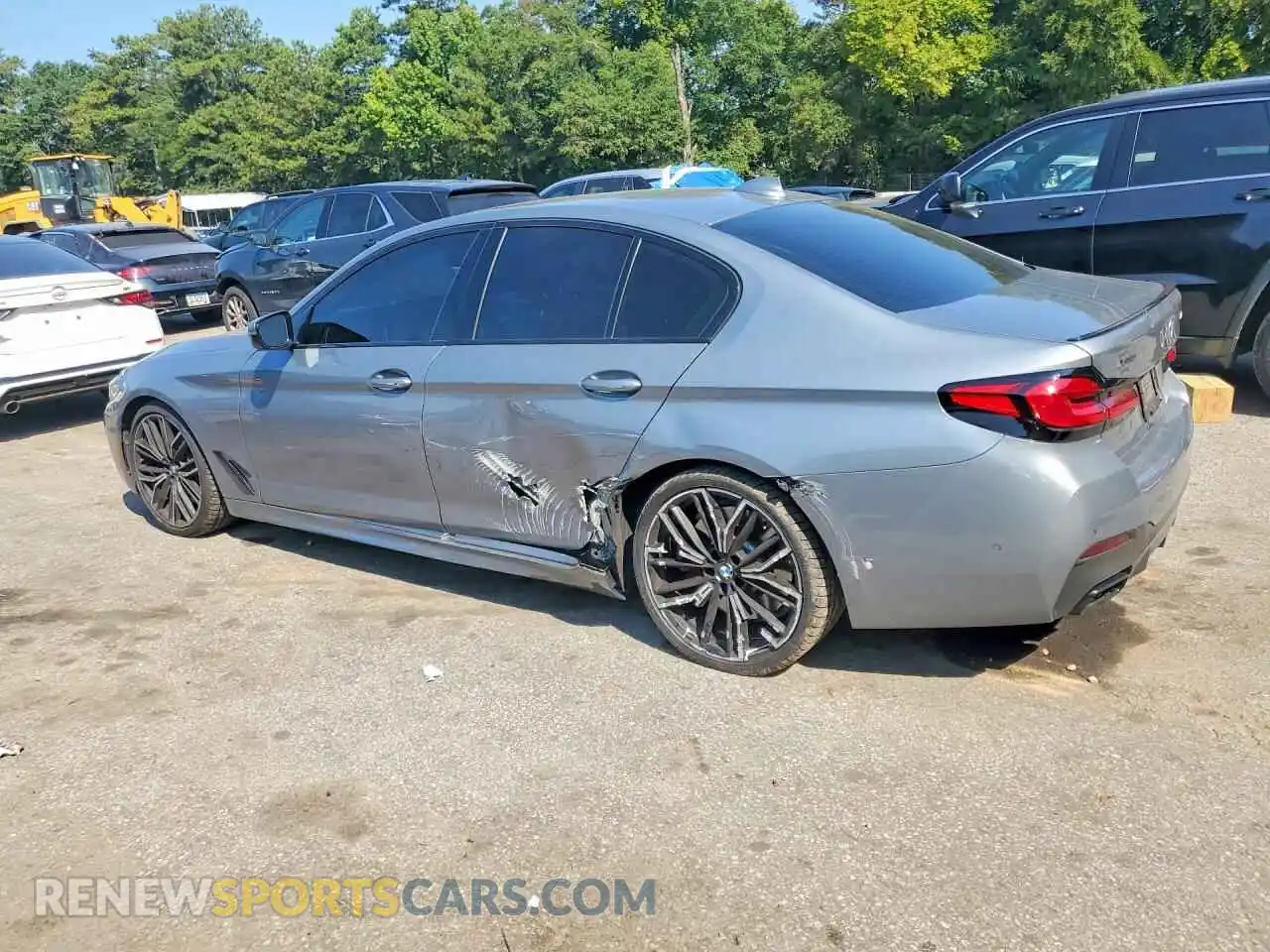 2 fotografías del automóvil dañado WBA13BK0XPCN82828 BMW M5 2023