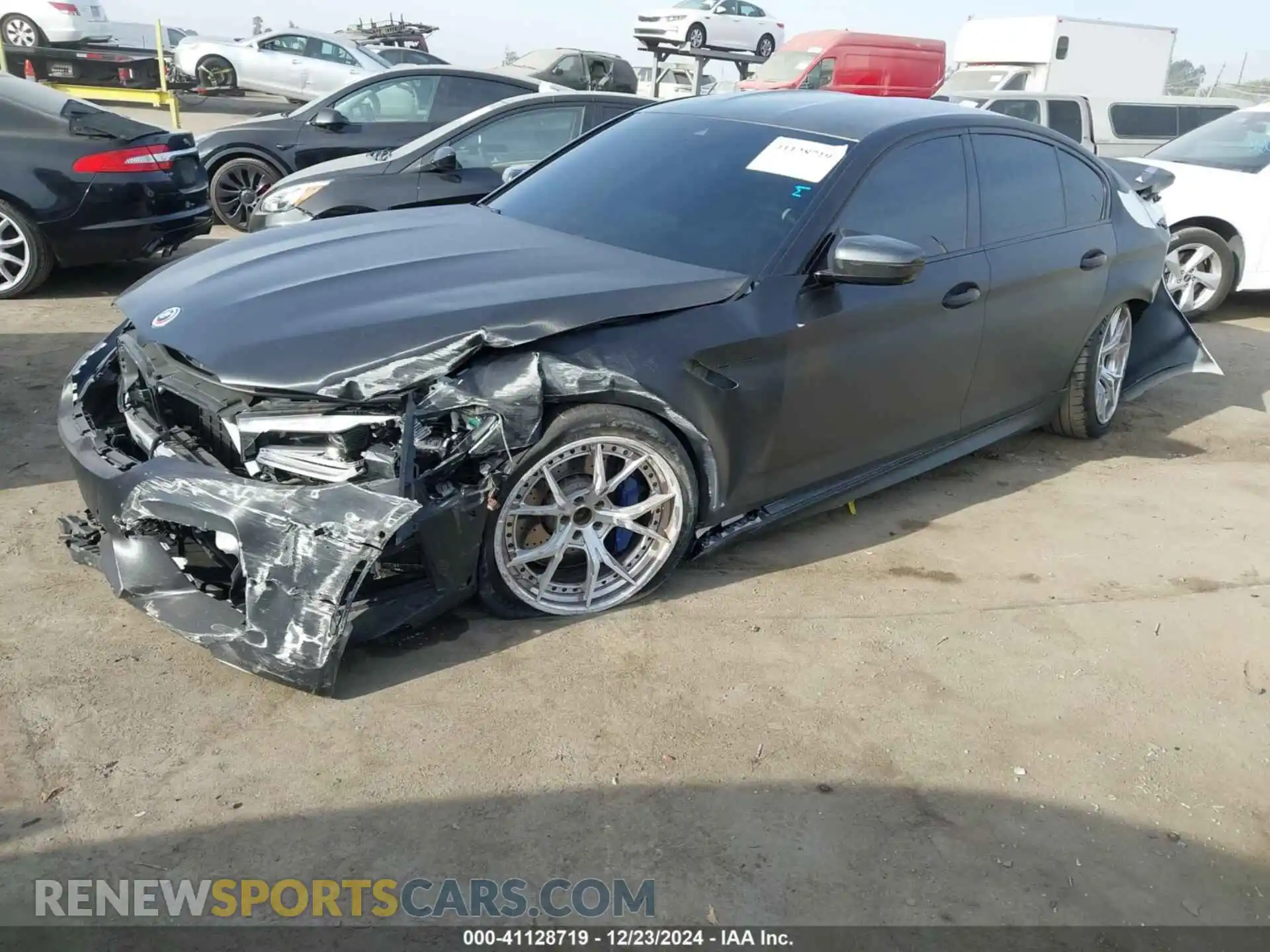 2 Photograph of a damaged car WBS83CH01PCN02954 BMW M5 2023